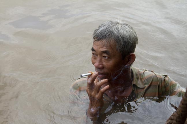 Saigon River Cigarette Break, Vietnam